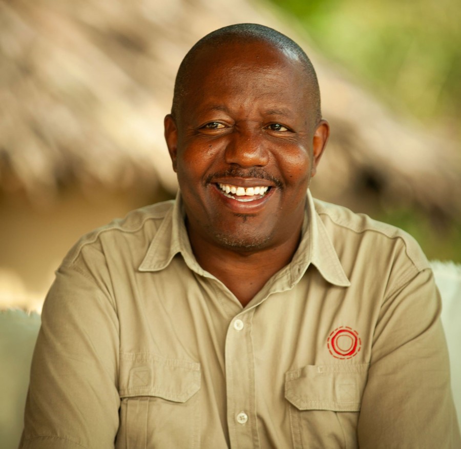 Laurence James, safari camp manager at Lamai Serengeti, smiling portrait